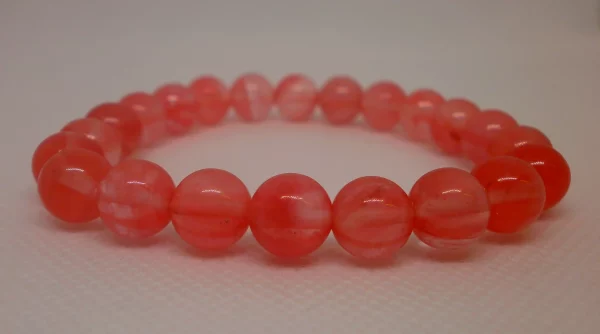 A watermelon quartz bracelet.